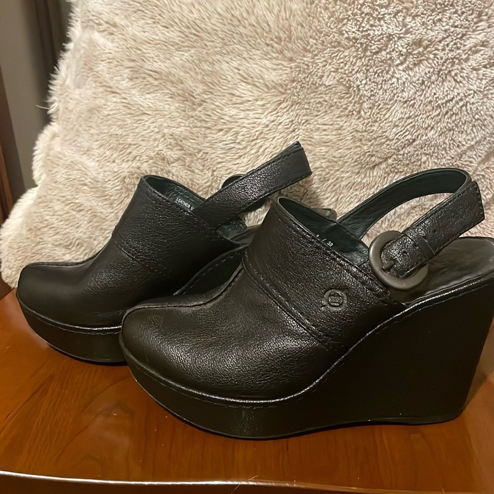 Leather Born mules with open back with strap. Barely worn